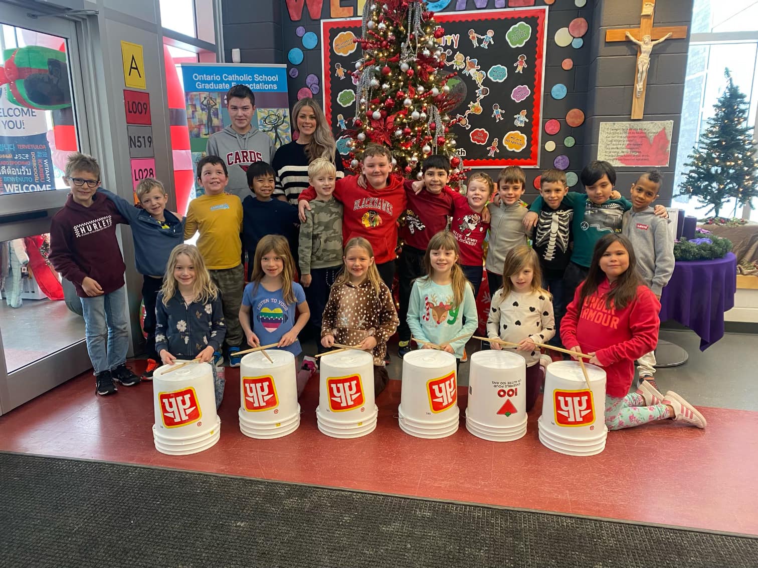 Holy Trinity Students Collaborate with St. Charles College for Christmas Concert Rehearsal 🥁